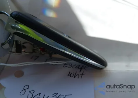 2017 Ford Escape Titanium z USA, uszkodzony, nr VIN 1FMCU0J91HUD85387